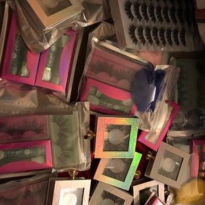 false lashes,lipglosses and keychains packages!!